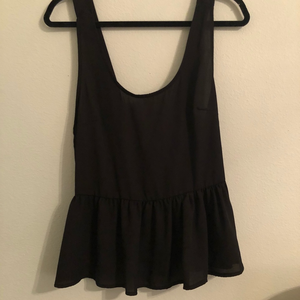 black peplum tank with bow on back
